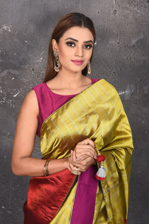 Shop stunning gold and grey matka silk saree online in USA with red pallu. Keep your ethnic wardrobe up to date with latest designer sarees, pure silk sarees, Kanchipuram silk sarees, handwoven saris, tussar silk sarees, embroidered saris from Pure Elegance Indian saree store in USA.-closeup
