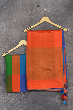 Shop stunning blue matka silk saree online in USA with orange pallu. Keep your ethnic wardrobe up to date with latest designer sarees, pure silk sarees, Kanchipuram silk sarees, handwoven saris, tussar silk sarees, embroidered saris from Pure Elegance Indian saree store in USA.-blouse