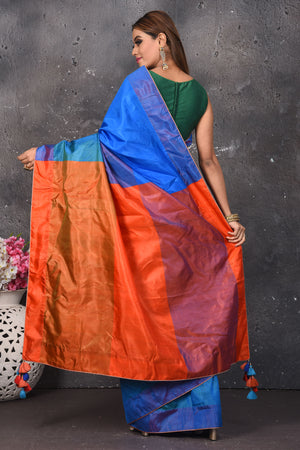 Shop stunning blue matka silk saree online in USA with orange pallu. Keep your ethnic wardrobe up to date with latest designer sarees, pure silk sarees, Kanchipuram silk sarees, handwoven saris, tussar silk sarees, embroidered saris from Pure Elegance Indian saree store in USA.-back