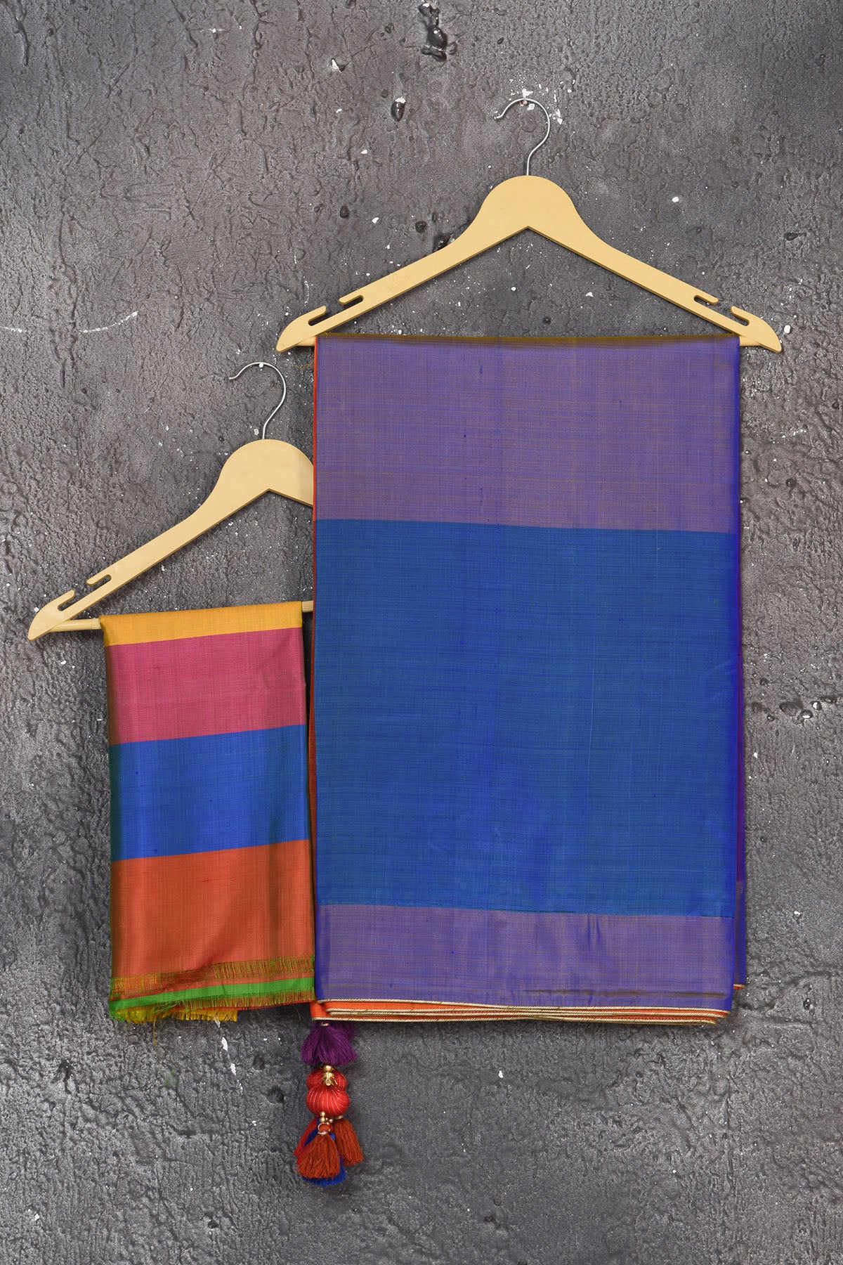 Shop stunning blue matka silk saree online in USA with orange and purple pallu. Keep your ethnic wardrobe up to date with latest designer sarees, pure silk sarees, Kanchipuram silk sarees, handwoven saris, tussar silk sarees, embroidered saris from Pure Elegance Indian saree store in USA.-blouse