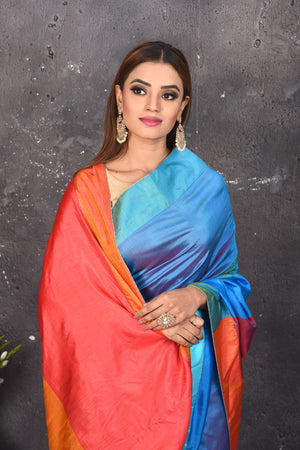Shop stunning blue matka silk saree online in USA with orange and purple pallu. Keep your ethnic wardrobe up to date with latest designer sarees, pure silk sarees, Kanchipuram silk sarees, handwoven saris, tussar silk sarees, embroidered saris from Pure Elegance Indian saree store in USA.-closeup
