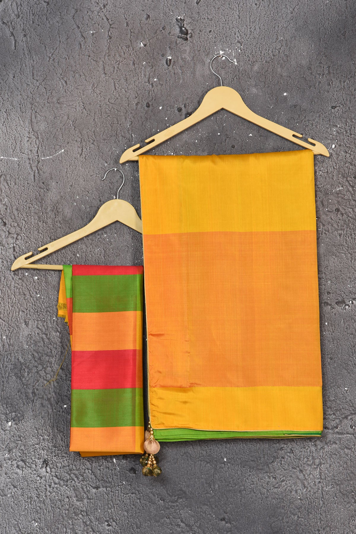 Buy stunning green matka silk saree online in USA with yellow pallu. Keep your ethnic wardrobe up to date with latest designer sarees, pure silk sarees, Kanchipuram silk sarees, handwoven saris, tussar silk sarees, embroidered saris from Pure Elegance Indian saree store in USA.-blouse