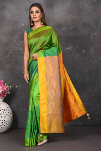 Buy stunning green matka silk saree online in USA with yellow pallu. Keep your ethnic wardrobe up to date with latest designer sarees, pure silk sarees, Kanchipuram silk sarees, handwoven saris, tussar silk sarees, embroidered saris from Pure Elegance Indian saree store in USA.-full view