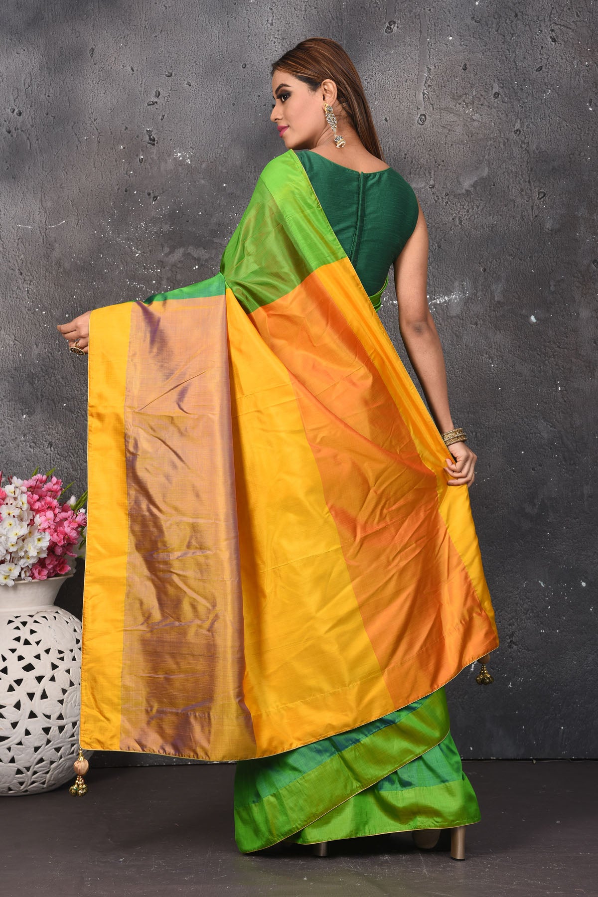 Buy stunning green matka silk saree online in USA with yellow pallu. Keep your ethnic wardrobe up to date with latest designer sarees, pure silk sarees, Kanchipuram silk sarees, handwoven saris, tussar silk sarees, embroidered saris from Pure Elegance Indian saree store in USA.-back