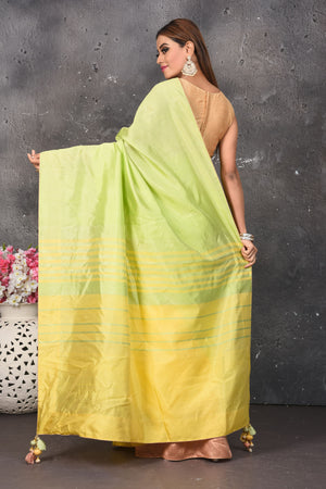 Shop beautiful pastel green and pink matka silk sari online in USA with yellow pallu. Keep your ethnic wardrobe up to date with latest designer sarees, pure silk sarees, Kanchipuram silk sarees, handwoven saris, tussar silk sarees, embroidered saris from Pure Elegance Indian saree store in USA.-back