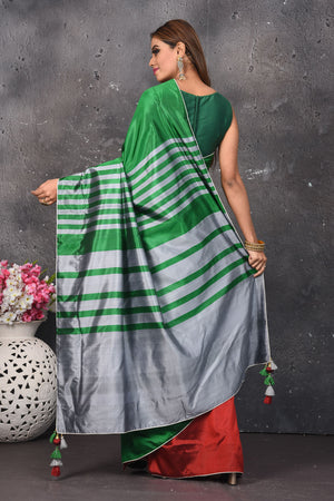 Shop beautiful green and red matka silk sari online in USA with grey pallu. Keep your ethnic wardrobe up to date with latest designer sarees, pure silk sarees, Kanchipuram silk sarees, handwoven saris, tussar silk sarees, embroidered saris from Pure Elegance Indian saree store in USA.-back