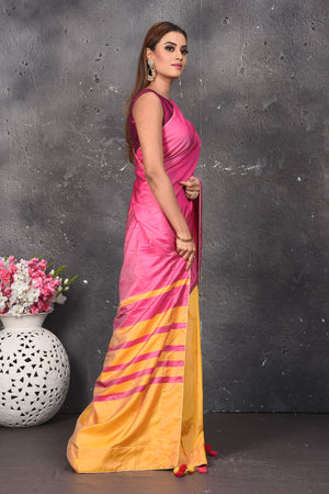 Shop stunning pink and orange matka silk sari online in USA. Keep your ethnic wardrobe up to date with latest designer sarees, pure silk sarees, Kanchipuram silk sarees, handwoven saris, tussar silk sarees, embroidered saris from Pure Elegance Indian saree store in USA.-side