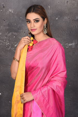 Shop stunning pink and orange matka silk sari online in USA. Keep your ethnic wardrobe up to date with latest designer sarees, pure silk sarees, Kanchipuram silk sarees, handwoven saris, tussar silk sarees, embroidered saris from Pure Elegance Indian saree store in USA.-closeup