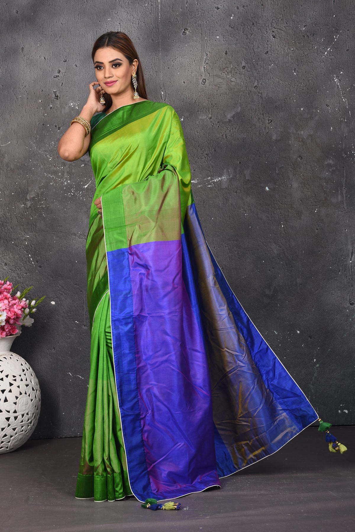 Shop beautiful light green matka silk sari online in USA with blue zari pallu. Keep your ethnic wardrobe up to date with latest designer sarees, pure silk sarees, Kanchipuram silk sarees, handwoven saris, tussar silk sarees, embroidered saris from Pure Elegance Indian saree store in USA.-full view