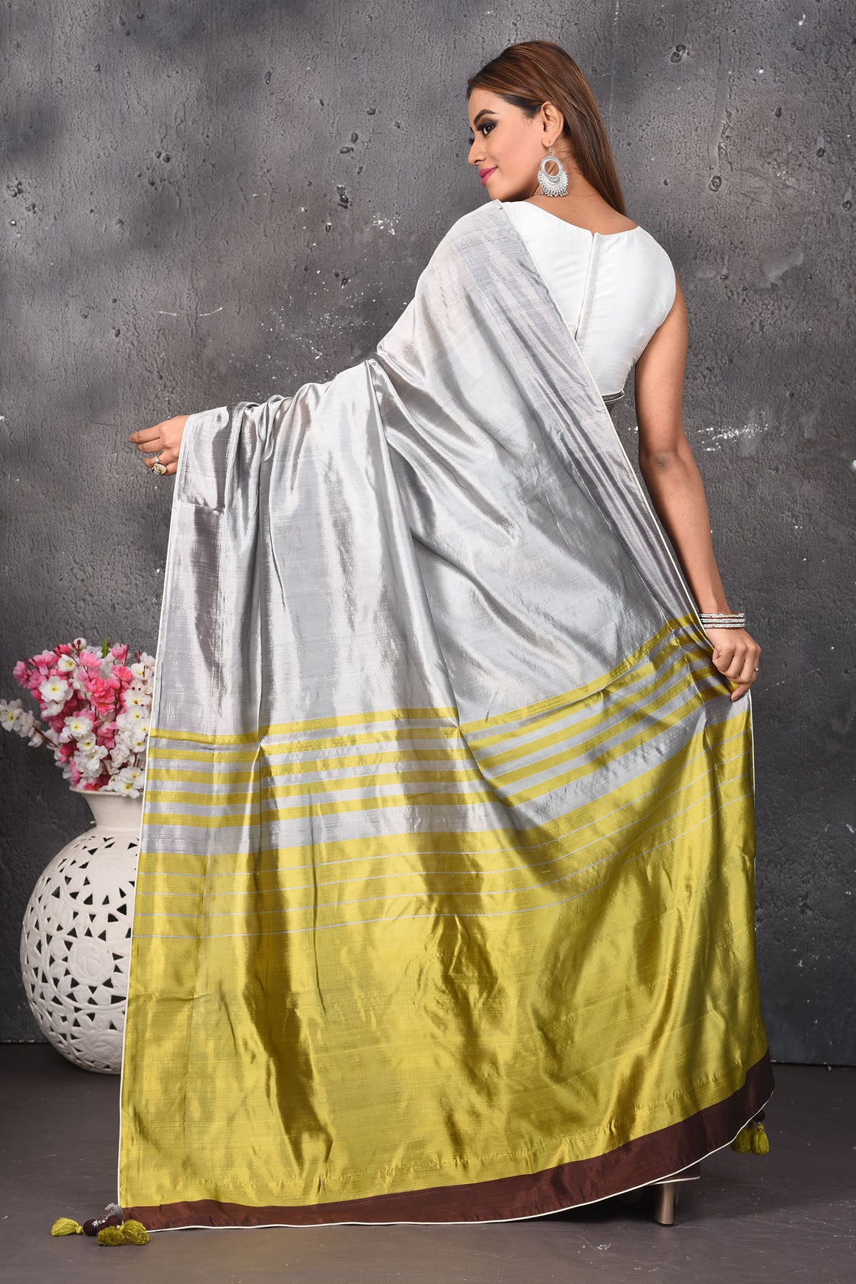 Shop stunning grey and brown matka silk saree online in USA with green pallu. Keep your ethnic wardrobe up to date with latest designer sarees, pure silk sarees, Kanchipuram silk sarees, handwoven saris, tussar silk sarees, embroidered saris from Pure Elegance Indian saree store in USA.-back