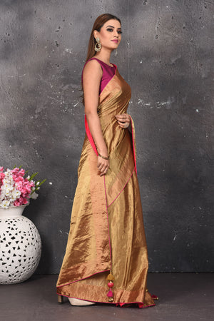 Shop stunning golden tissue Uppada saree online in USA. Keep your ethnic wardrobe up to date with latest designer sarees, pure silk sarees, Kanchipuram silk sarees, handwoven saris, tussar silk sarees, embroidered saris from Pure Elegance Indian saree store in USA.-side