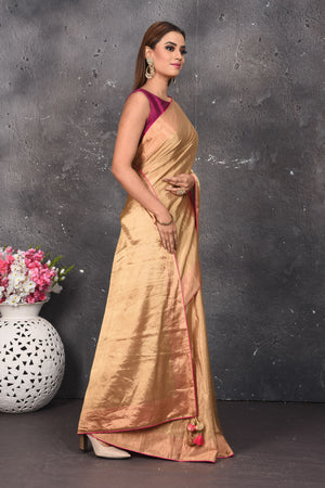 Buy beautiful dull golden tissue Uppada saree online in USA. Keep your ethnic wardrobe up to date with latest designer sarees, pure silk sarees, Kanchipuram silk sarees, handwoven saris, tussar silk sarees, embroidered saris from Pure Elegance Indian saree store in USA.-side