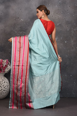 Shop beautiful light blue Mashru silk saree online in USA with striped pallu. Be the center of attraction on special occasions in stunning silk sarees, handloom sarees, embroidered sarees, designer sarees, Bollywood sarees from Pure Elegance Indian fashion store in USA.-back