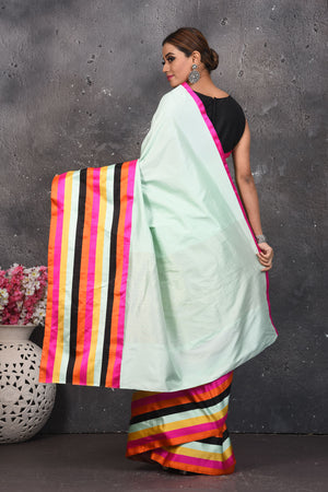Buy stunning mint green Mashru silk sari online in USA with multicolor stripes border. Be the center of attraction on special occasions in stunning silk sarees, handloom sarees, embroidered sarees, designer sarees, Bollywood sarees from Pure Elegance Indian fashion store in USA.-back