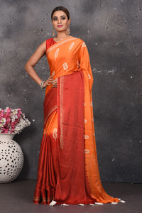 Shop stunning orange and red printed modal silk sari online in USA. Be the center of attraction on special occasions in stunning silk sarees, handloom sarees, embroidered sarees, designer sarees, Bollywood sarees from Pure Elegance Indian fashion store in USA.-full view