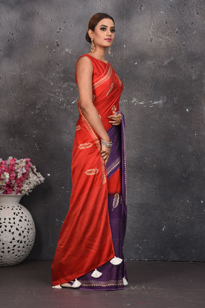 Buy beautiful purple and red printed modal silk saree online in USA. Be the center of attraction on special occasions in stunning silk sarees, handloom sarees, embroidered sarees, designer sarees, Bollywood sarees from Pure Elegance Indian fashion store in USA.-side