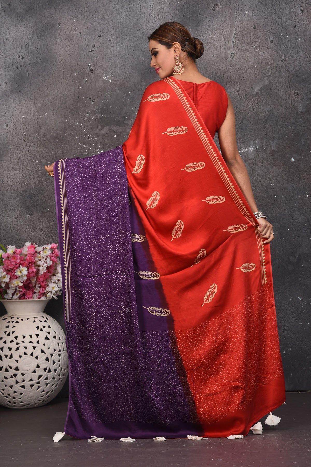 Buy beautiful purple and red printed modal silk saree online in USA. Be the center of attraction on special occasions in stunning silk sarees, handloom sarees, embroidered sarees, designer sarees, Bollywood sarees from Pure Elegance Indian fashion store in USA.-back