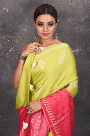 Shop stunning pista green and pink printed modal silk sari online in USA. Be the center of attraction on special occasions in stunning silk sarees, handloom sarees, embroidered sarees, designer sarees, Bollywood sarees from Pure Elegance Indian fashion store in USA.-closeup