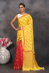 Shop stunning yellow and red printed modal silk sari online in USA. Be the center of attraction on special occasions in stunning silk sarees, handloom sarees, embroidered sarees, designer sarees, Bollywood sarees from Pure Elegance Indian fashion store in USA.-full view