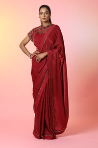 Buy stunning blood red embellished crepe saree online in USA with designer saree blouse. Look perfect in ethnic style on special occasions in beautiful designer sarees, embroidered sarees, party sarees, Bollywood sarees, handloom sarees from Pure Elegance Indian saree store in USA.-full view