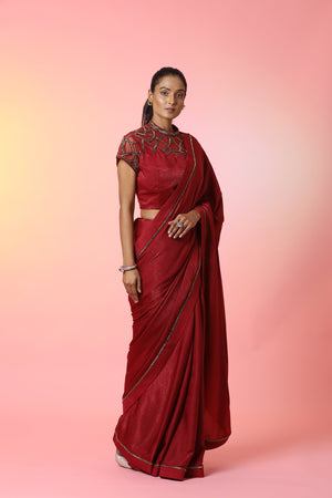 Buy stunning blood red embellished crepe saree online in USA with designer saree blouse. Look perfect in ethnic style on special occasions in beautiful designer sarees, embroidered sarees, party sarees, Bollywood sarees, handloom sarees from Pure Elegance Indian saree store in USA.-side