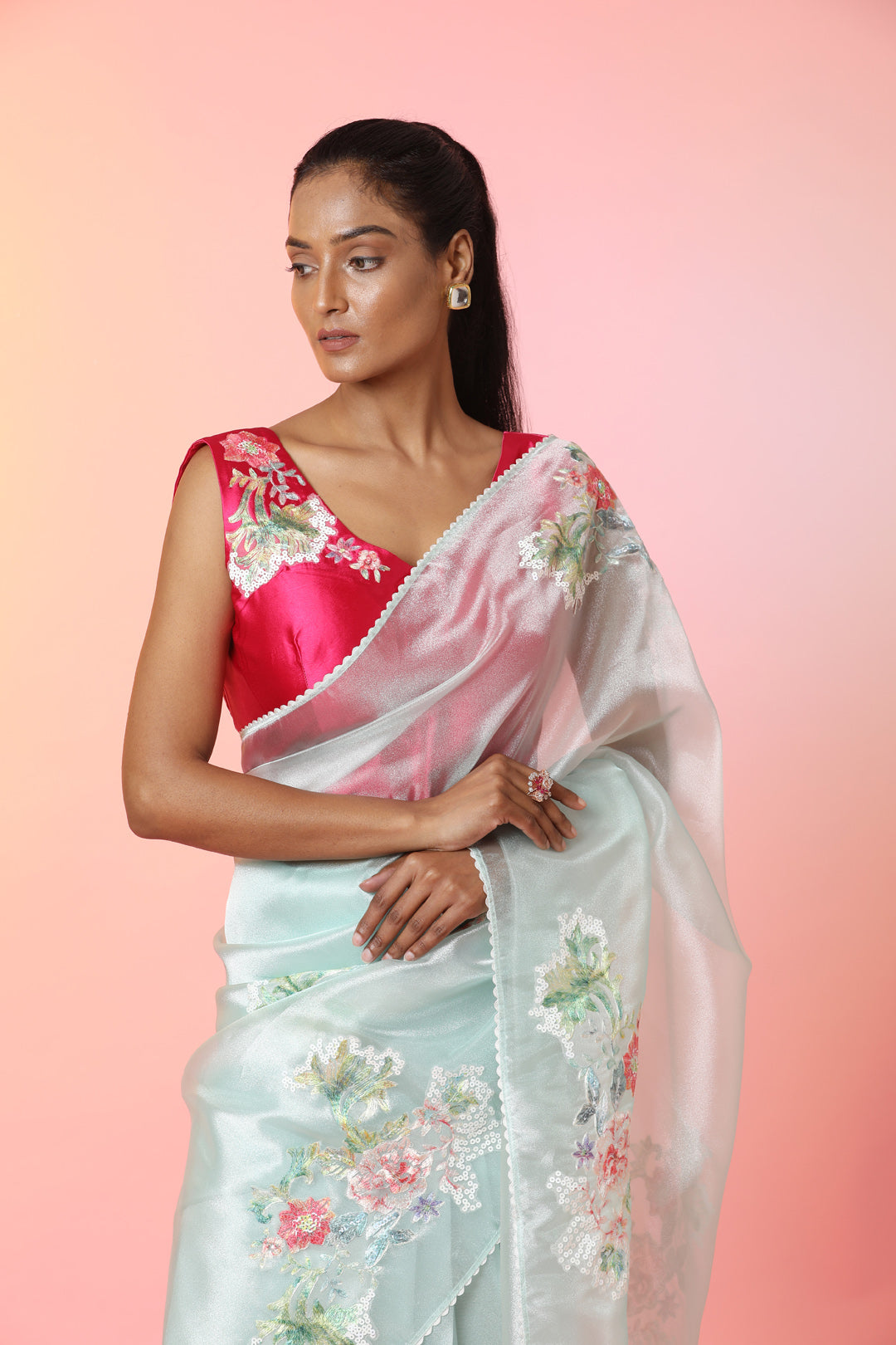Buy beautiful mint green embroidered tissue organza saree online in USA with pink saree blouse. Look perfect in ethnic style on special occasions in beautiful designer sarees, embroidered sarees, party sarees, Bollywood sarees, handloom sarees from Pure Elegance Indian saree store in USA-closeup