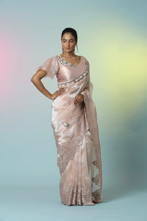 Shop beautiful champagne pink embroidered tissue organza saree online in USA with saree blouse. Look perfect in ethnic style on special occasions in beautiful designer sarees, embroidered sarees, party sarees, Bollywood sarees, handloom sarees from Pure Elegance Indian saree store in USA.-side