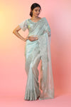 Shop stunning mint green tissue saree online in USA with lace border. Look perfect in ethnic style on special occasions in beautiful designer sarees, embroidered sarees, party sarees, Bollywood sarees, handloom sarees from Pure Elegance Indian saree store in USA.-full view