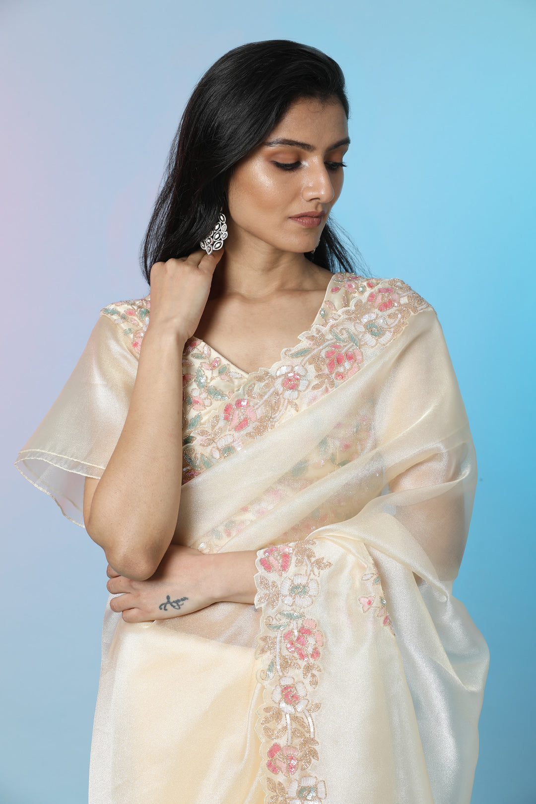Shop beautiful light yellow embroidered tissue organza saree online in USA with saree blouse. Look perfect in ethnic style on special occasions in beautiful designer sarees, embroidered sarees, party sarees, Bollywood sarees, handloom sarees from Pure Elegance Indian saree store in USA.-closeup
