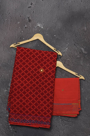 Shop this classy red hand painted madhubani cotton saree online in USA. Perfect to be worn as part of your everyday work wear, with this hand-painted red Madhubani saree, elegance meets traditional. Add this designer Lambani embroidery designer saree with colored tassels to your collection from Pure Elegance Indian Fashion Store in USA.- Unstitched blouse.