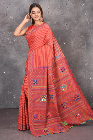 Buy this classy red hand painted madhubani cotton leheriya pattern saree online in USA. Perfect to be worn as part of your everyday work wear, with this hand-painted red Madhubani saree, elegance meets traditional. Add this designer Lambani embroidery designer saree with colored tassels to your collection from Pure Elegance Indian Fashion Store in USA.- Full view.
