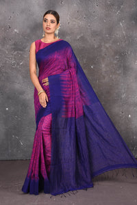Shop this elegant blue-pink handloom shibori tussar saree online in USA which is handcrafted from fine silk tussar fabric, this tie and dye saree brings out the nature of flow. You can pair this beautiful shibori print with minimal jewellery for a casual day outfit. Add this plain shibori saree to your collection from Pure Elegance Indian fashion store in USA.- Full view.