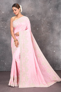 Shop this elegant baby pink gota patti mirror embroidered soft organza silk designer saree online in USA with colourful threadwork of flowers, gota patti leaves and dazzling cut dana and mirror work details. Mirror bootis are scattered all over the saree to match the brightness of the happy pink look. Add this designer sari to your collection from Pure Elegance Indian fashion store in USA.-Full view.