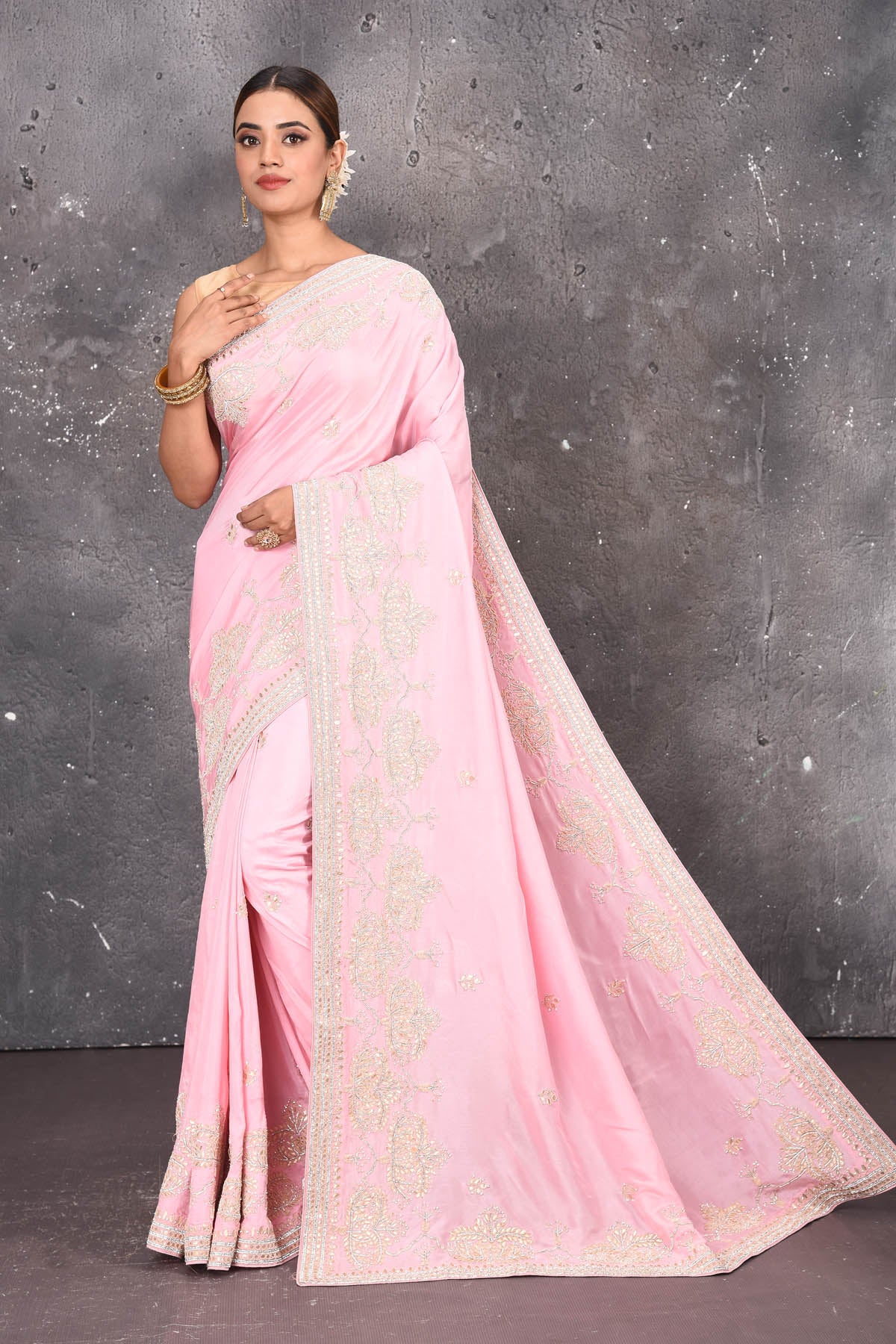 Shop this elegant baby pink gota patti mirror embroidered soft organza silk designer saree online in USA with colourful threadwork of flowers, gota patti leaves and dazzling cut dana and mirror work details. Mirror bootis are scattered all over the saree to match the brightness of the happy pink look. Add this designer sari to your collection from Pure Elegance Indian fashion store in USA.-Full view with open pallu.
