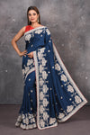 Buy this elegant navy blue gota patti mirror embroidered soft organza silk designer saree online in USA with colourful threadwork of flowers, gota patti leaves and dazzling cut dana and mirror work details. Mirror bootis are scattered all over the saree to match the brightness of the happy look. Add this designer sari to your collection from Pure Elegance Indian fashion store in USA.-Full view.