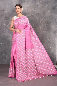 Shop elegant red zari woven pure tussar gicha silk saree in pink color with beautiful mirrorwork online in USA which has crafted by skilled weaver of Banaras with elegance and grace, this saree is definitely the epitome of beauty and a must have in your collection. Buy designer handwoven sarees from Pure Elegance which brings you our latest collection of Bhagalpuri handwoven tussar silk sarees.-Full view.