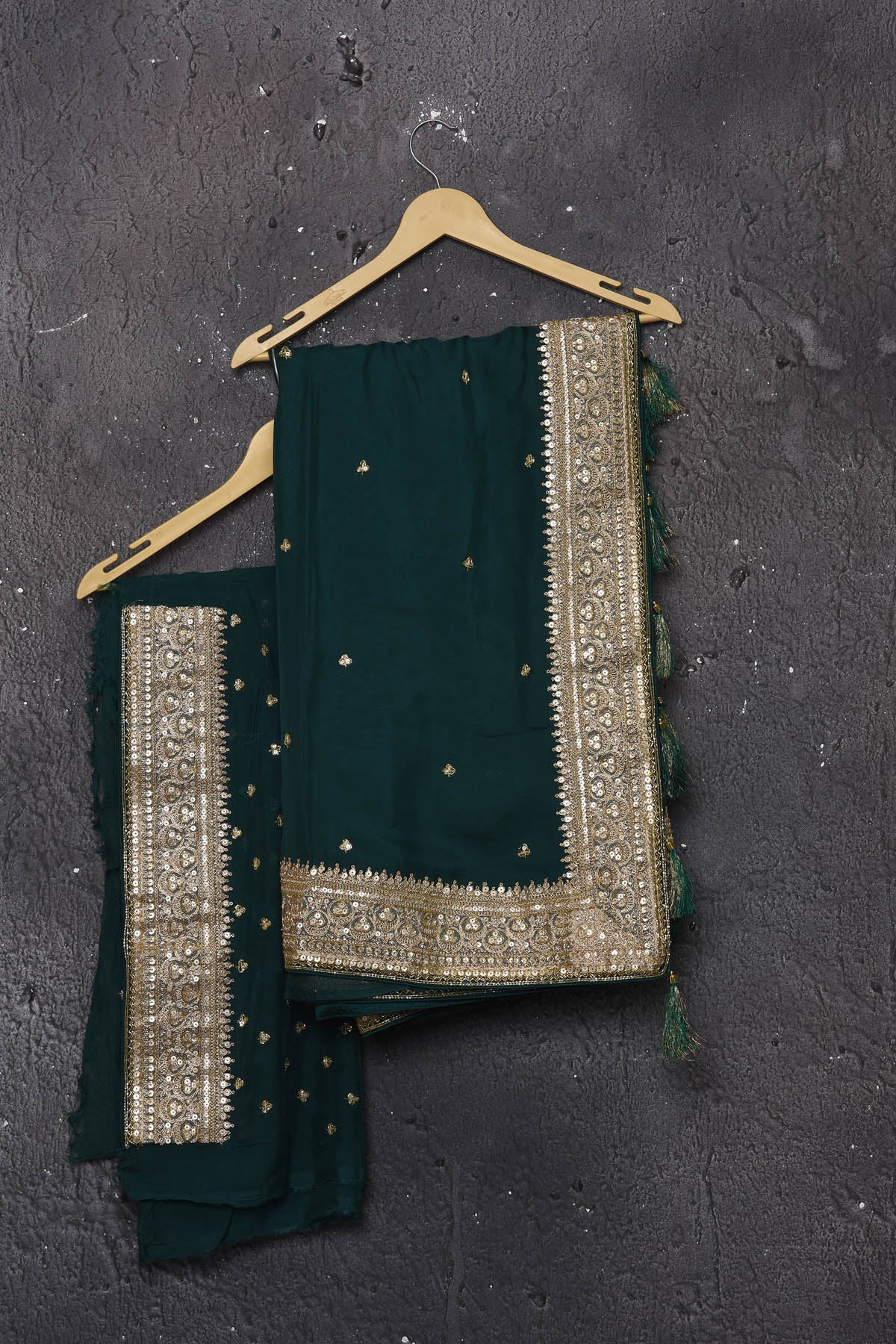 Buy exquisite pine green georgette banarasi designer saree with golden heavy Border online in USA which has crafted by skilled weaver of Banaras with elegance and grace, this saree is definitely the epitome of beauty and a must have in your collection. Buy designer handwoven banarasi georgette sari with any blouse from Pure Elegance Indian saree store in USA.-Unstitched blouse.