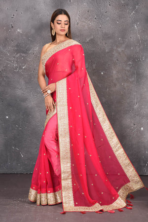 Shop exquisite pink georgette banarasi designer saree with golden heavy Border online in USA which has crafted by skilled weaver of Banaras with elegance and grace, this saree is definitely the epitome of beauty and a must have in your collection. Buy designer handwoven banarasi georgette sari with any blouse from Pure Elegance Indian saree store in USA.-Full view.