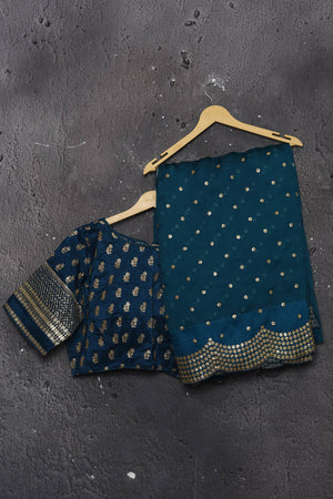 Buy exquisite blue organza saree with golden embroidered online in USA. Pure organza sarees by Pure Elegance in blue color. It has a beautiful gold embroidered border. This organza brings the charm and simplicity of this saree with border and pallu with the delegate embroidery work on border. Shop this designer silk sari from Pure Elegance Indian fashion store in USA.-Ready blouse.