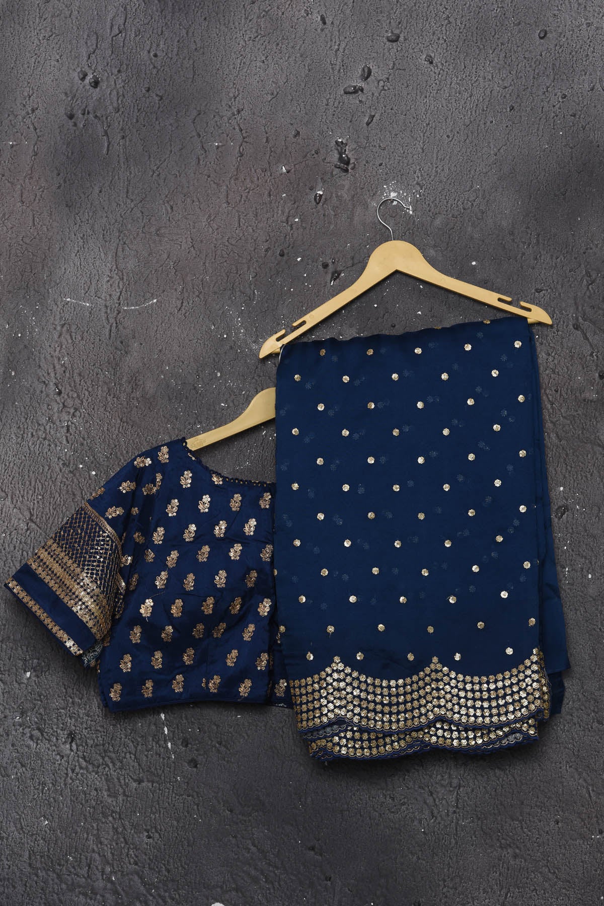 Buy exquisite navy blue organza saree with golden embroidered online in USA. Pure organza sarees by Pure Elegance in blue color. It has a beautiful gold embroidered border. This organza brings the charm and simplicity of this saree with border and pallu with the delegate embroidery work on border. Shop this designer silk sari from Pure Elegance Indian fashion store in USA.-Ready blouse.