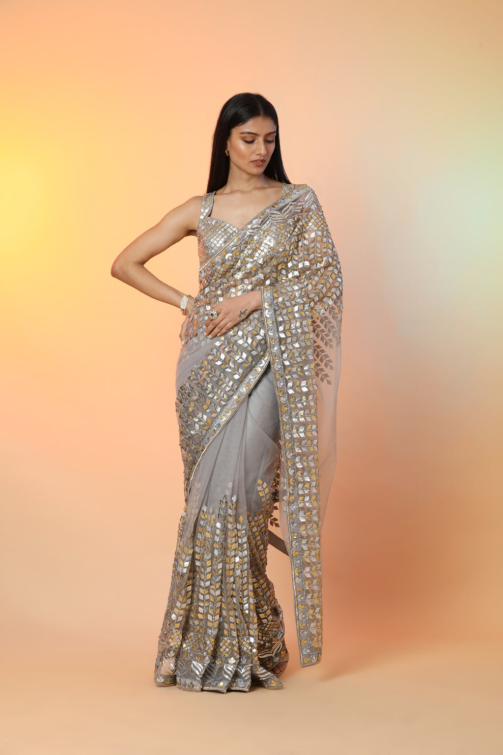Buy beautiful grey diamond applique work designer sari online in USA with blouse. Radiate glamor on special occasions in exquisite designer sarees, embroidered sarees, partywear saris, Bollywood sarees, fancy sarees from from Pure Elegance Indian saree store in USA.-full view