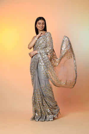 Buy beautiful grey diamond applique work designer sari online in USA with blouse. Radiate glamor on special occasions in exquisite designer sarees, embroidered sarees, partywear saris, Bollywood sarees, fancy sarees from from Pure Elegance Indian saree store in USA.-side