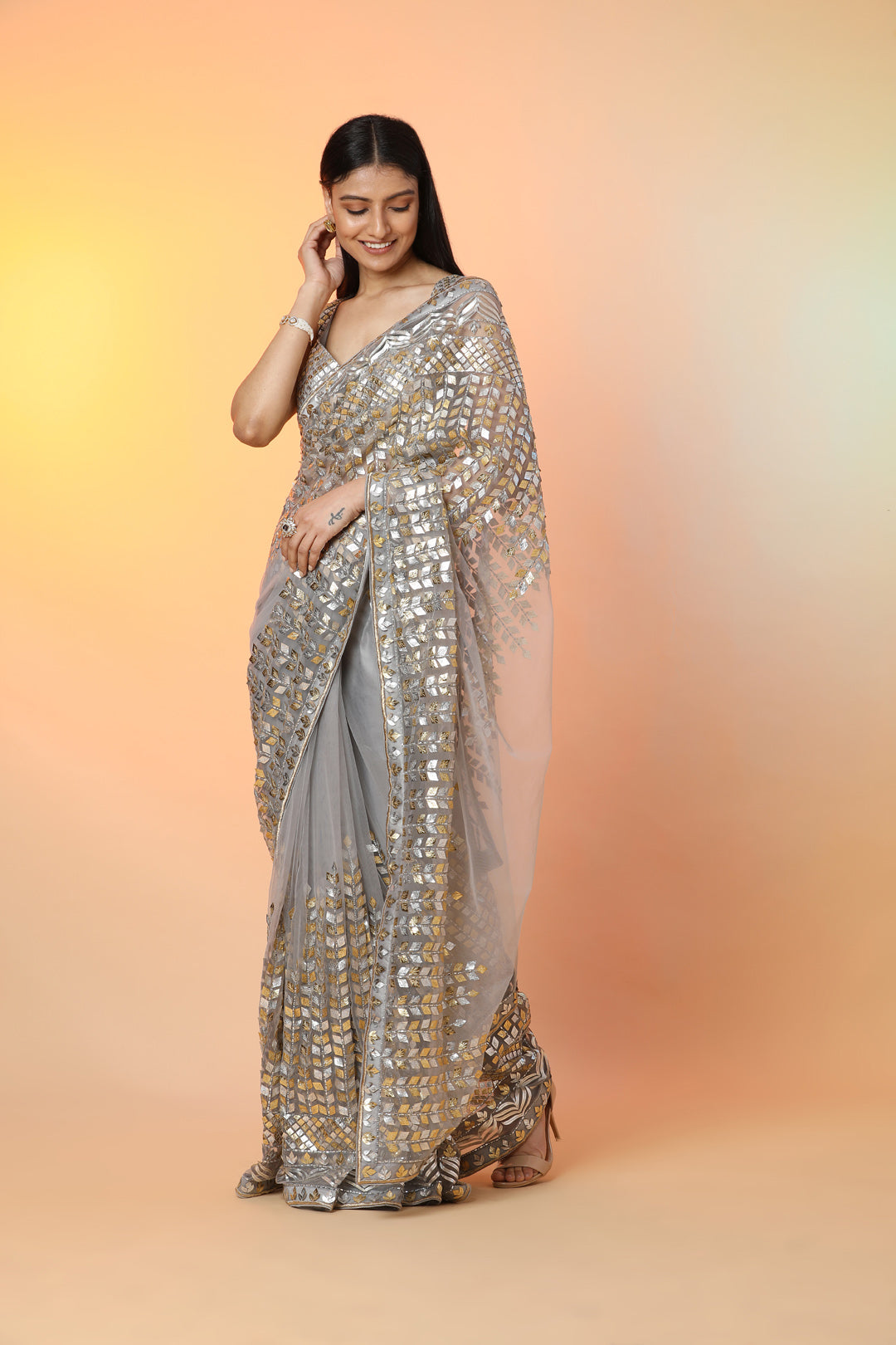 Buy beautiful grey diamond applique work designer sari online in USA with blouse. Radiate glamor on special occasions in exquisite designer sarees, embroidered sarees, partywear saris, Bollywood sarees, fancy sarees from from Pure Elegance Indian saree store in USA.-left