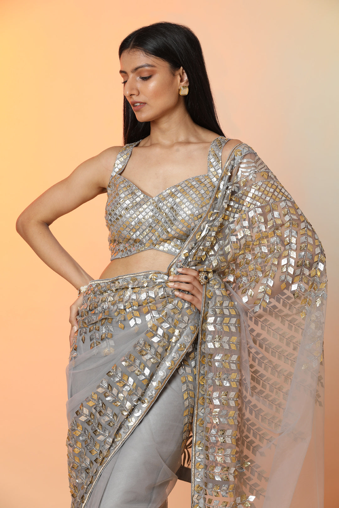 Buy beautiful grey diamond applique work designer sari online in USA with blouse. Radiate glamor on special occasions in exquisite designer sarees, embroidered sarees, partywear saris, Bollywood sarees, fancy sarees from from Pure Elegance Indian saree store in USA.-closeup