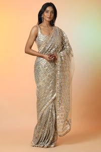 Buy stunning cream diamond applique work designer saree online in USA with blouse. Radiate glamor on special occasions in exquisite designer sarees, embroidered sarees, partywear saris, Bollywood sarees, fancy sarees from from Pure Elegance Indian saree store in USA.-full view