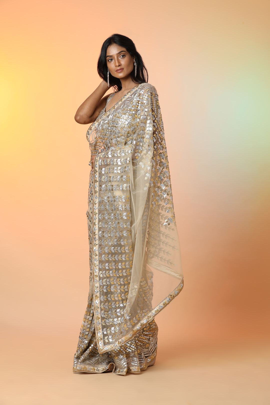 Buy stunning cream diamond applique work designer saree online in USA with blouse. Radiate glamor on special occasions in exquisite designer sarees, embroidered sarees, partywear saris, Bollywood sarees, fancy sarees from from Pure Elegance Indian saree store in USA.-side