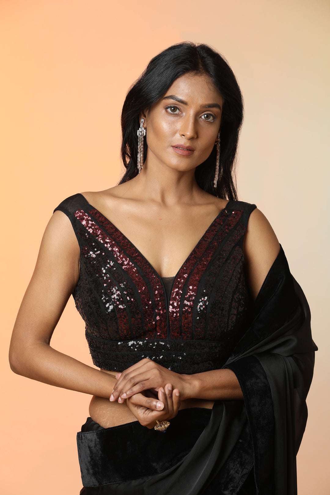 Buy beautiful black crepe saree online in USA with velvet border and saree blouse. Radiate glamor on special occasions in exquisite designer sarees, embroidered sarees, partywear saris, Bollywood sarees, fancy sarees from from Pure Elegance Indian saree store in USA.-closeup