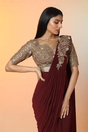 Shop beautiful wine cutwork ready crepe saree online in USA with saree blouse. Radiate glamor on special occasions in exquisite designer sarees, embroidered sarees, partywear saris, Bollywood sarees, fancy sarees from from Pure Elegance Indian saree store in USA.-closeup