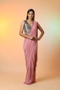 Buy stunning dusty pink ready crepe saree online in USA with metallic saree blouse. Radiate glamor on special occasions in exquisite designer sarees, embroidered sarees, partywear saris, Bollywood sarees, fancy sarees from from Pure Elegance Indian saree store in USA.-full view