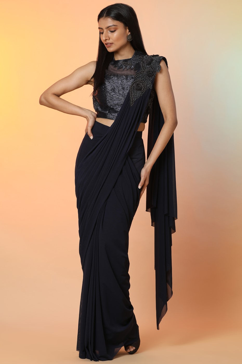 Shop stunning black crepe designer ready to wear sari online in USA with blouse. Radiate glamor on special occasions in exquisite designer sarees, embroidered sarees, partywear saris, Bollywood sarees, fancy sarees from from Pure Elegance Indian saree store in USA.-full view